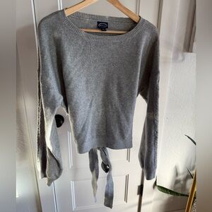 Open back sweater with tie back